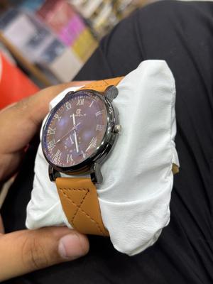 Unisex Movement: Quartz, Water Resistant Watch
