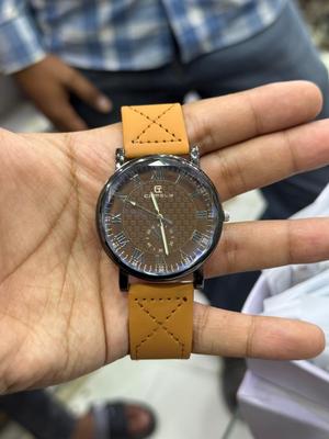 Unisex Movement: Quartz, Water Resistant Watch