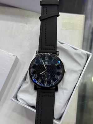 Unisex Movement: Quartz, Water Resistant Watch